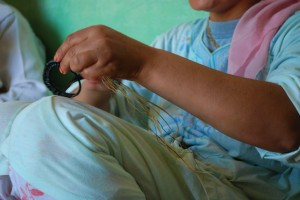 A craftswoman weaving